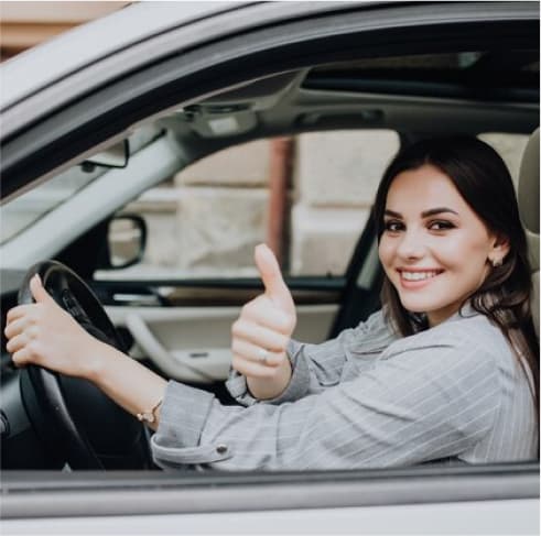 Driving Hub - Car - Parking - Girl smiling - right driving school