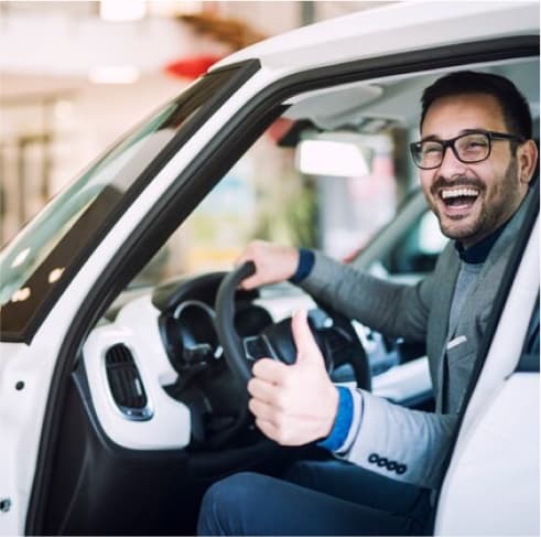 Driving Hub - Car - Parking - Boy smiling - driving school in vaughan